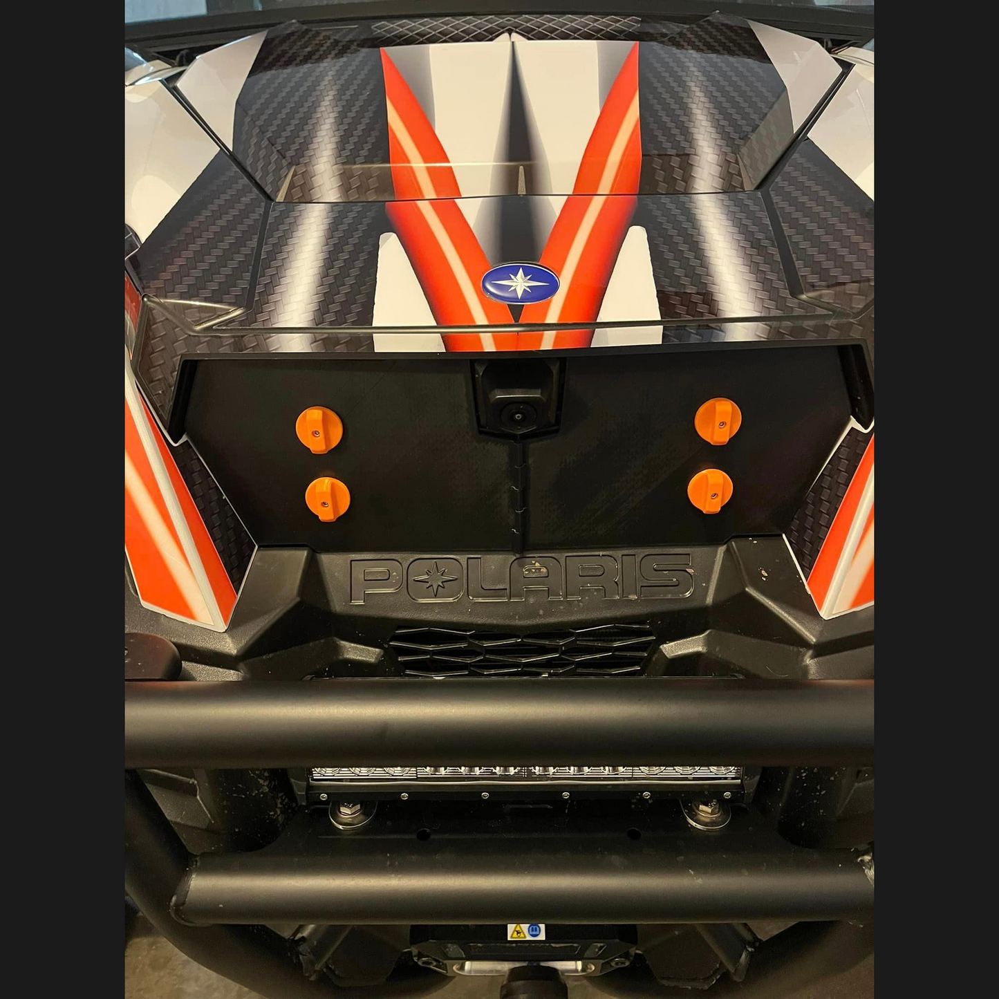 Showing the Polaris General Eliminator grill cover by OnlyGenerals installed with orange knobs.