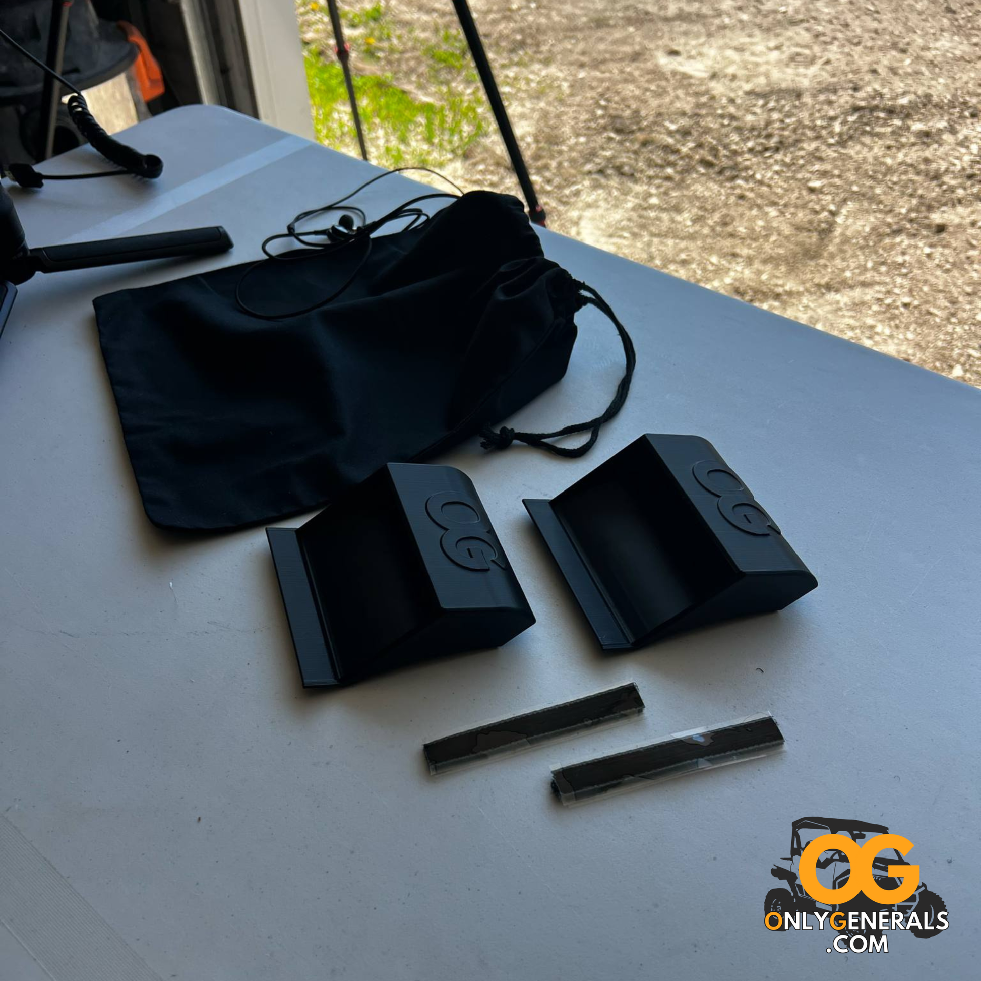 Black heater vent extenders on a table with 'Only Generals' branding.