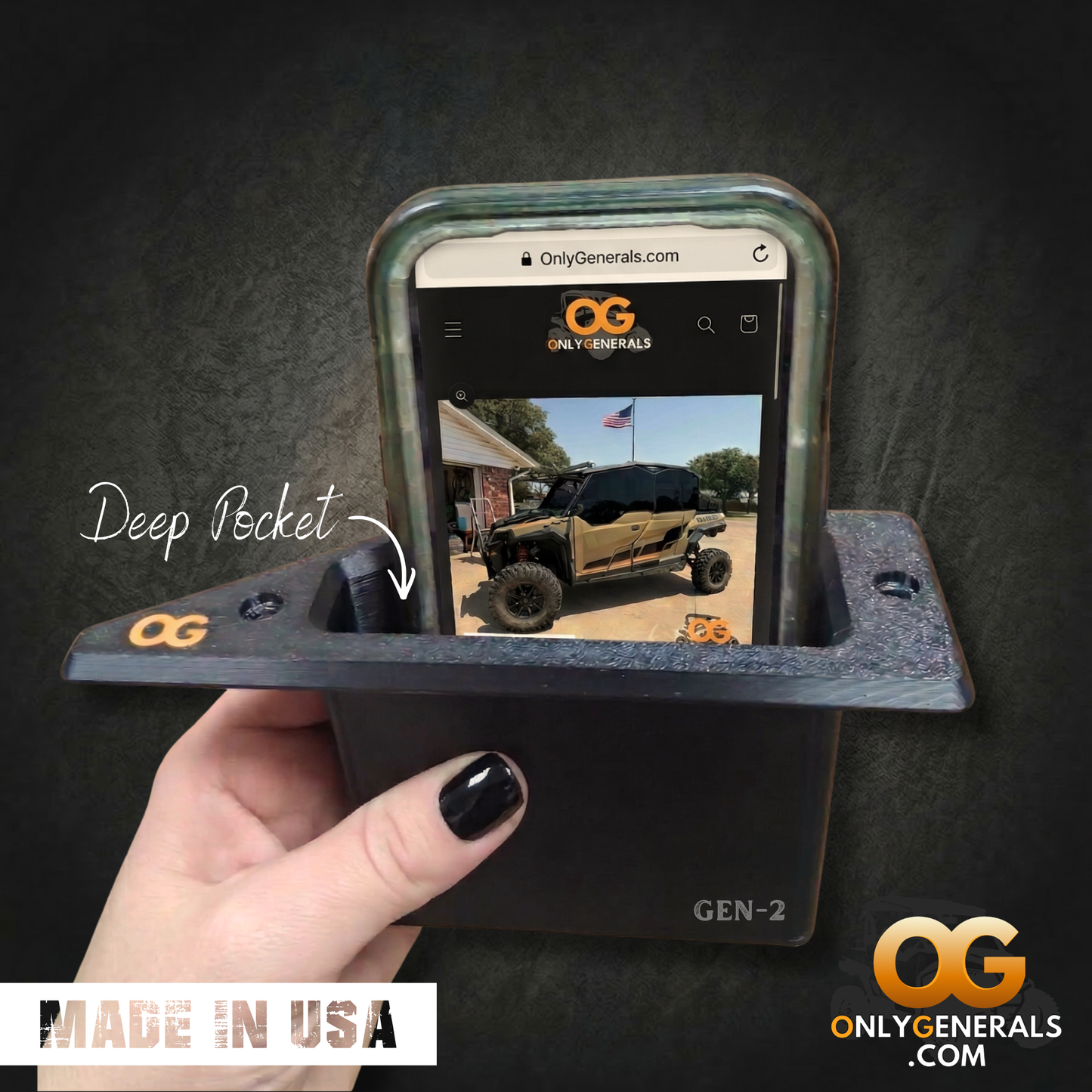 A hand is holding the OnlyGenerals recessed door handle for the Polaris General with a cell phone tucked into the pocket.  A made in USA stamp and OG logo is along the bottom.