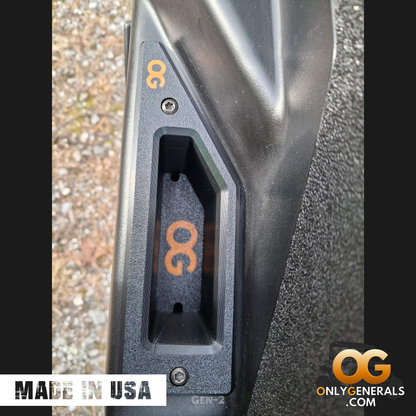 Showing a driver door with the OnlyGenerals recessed door handle for the Polaris General installed.  A made in USA stamp and OG logo is along the bottom.
