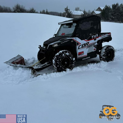Customer submitted photo with a Polaris General plowing snow and showing off their SideskinsLITE hard upper doors from OnlyGenerals