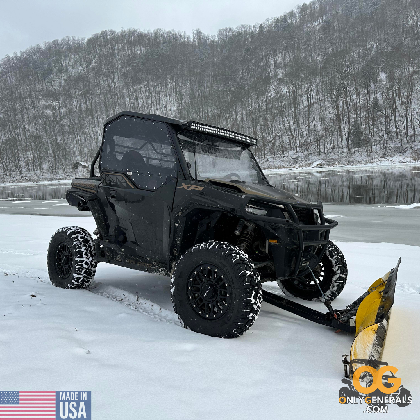 Customer submitted photo with a Polaris General plowing snow & showing off their SideskinsLITE hard upper doors from OnlyGenerals